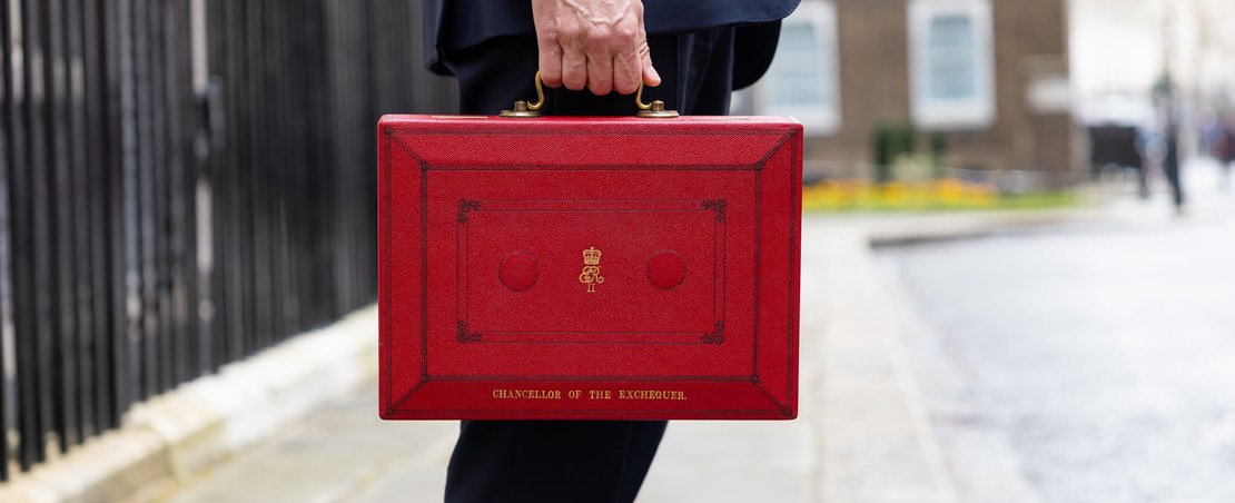 The Chancellor Jeremy Hunt walks outside Downing Street with the Budget box. Photo by Zara Farrar / HM Treasury
