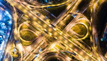 Urban night traffic with vehicle light top view