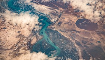 A drone view of Iceland's landscape: river and land