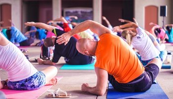 Group stretching in yoga class