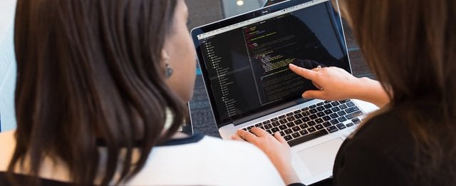 Women looking at computer screen