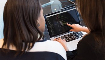 Women looking at computer screen