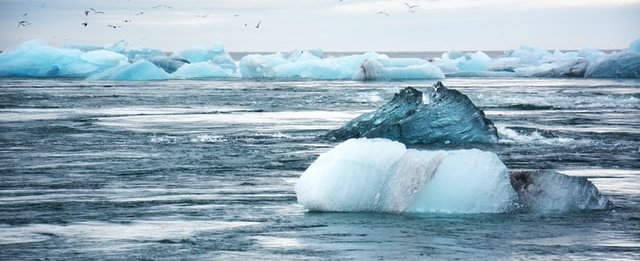 Icebergs, ocean, sky