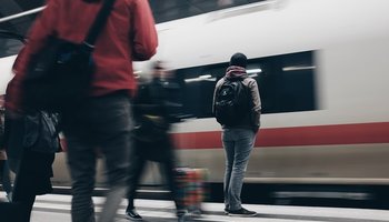 People standing on train platform