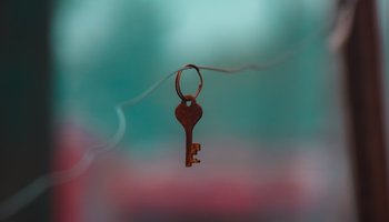 key hanging on wire