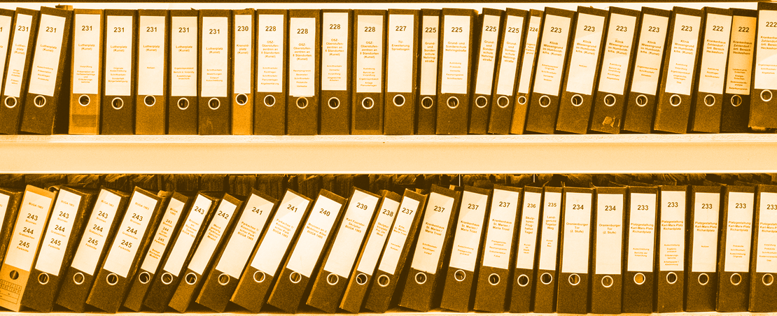 shelves full of paper binders