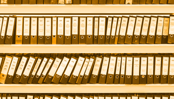 shelves full of paper binders